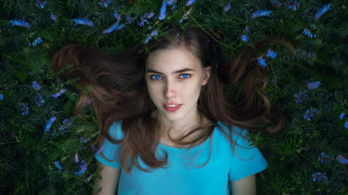 Woman grass blowing hair blue - anka zhuravleva free wallpaper