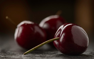Cherries closeup dof photorealistic 3d - a table top free wallpaper