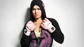 Woman pink gloves black hoodie - a picture free wallpaper