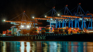 Cargo ship containers night cityscape - carl walter liner free wallpaper