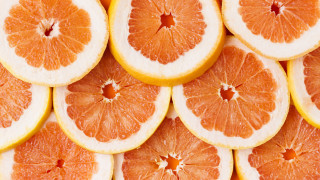 Oranges cut half stacked missing - a close up of a bunch free wallpaper