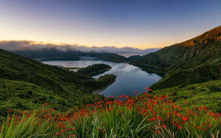 Lake mountains flowers sunset clouds - sky in the background free wallpaper