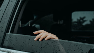 Hand rain drops car window - the window free wallpaper