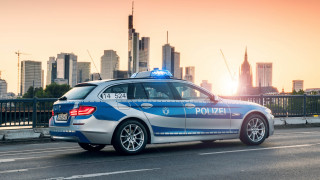 Police car city skyline sunset - ernst free wallpaper