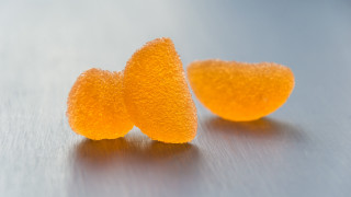 Peeled orange closeup table silver - orange free wallpaper