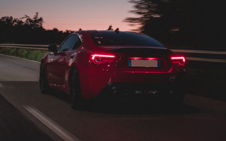 Red sports car night road 8 - the rear free wallpaper