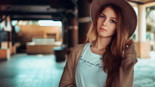 Woman hat white shirt portrait - a wooden floor free wallpaper