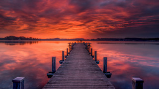 Sunset dock lake clouds cityscape - a sunset in the background free wallpaper
