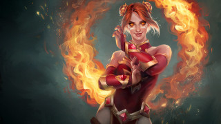 Fire woman red gold embers - a green background behind her free wallpaper