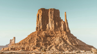 Desert rock formation sky people - a few person free wallpaper