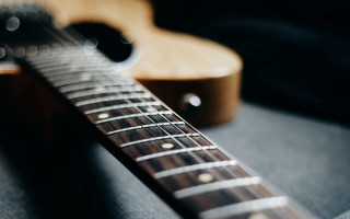 Guitar neck picker tabletop background - a table top free wallpaper