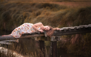 Woman lying bridge flowers dress - claire dalby free wallpaper