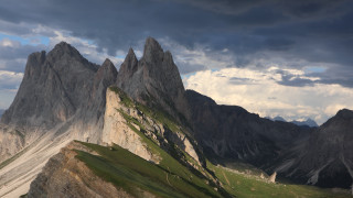 Mountain range green grass clouds - the side of it free wallpaper