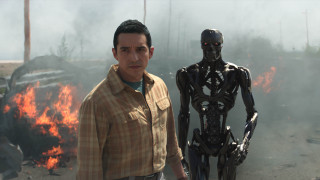 Man robot fire smoke embers - a man in the background free wallpaper