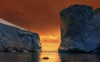 Iceberg sunset boat mountain ocean - near free wallpaper
