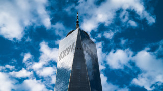 Tower skyline clouds plane beach - overhead free wallpaper