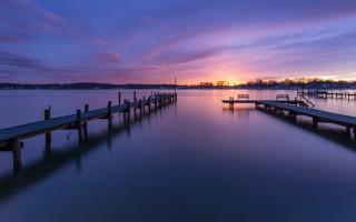 Sunset dock reflection cityscape clouds - a dock in the foreground free wallpaper