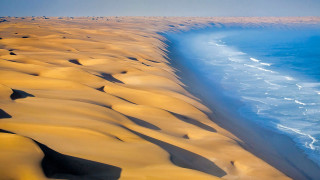 Sand dunes ocean wave sky - amir zand free wallpaper