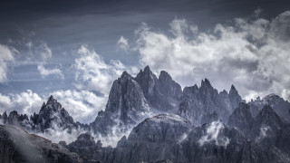 Mountain range clouds sun sheep - a few sheep free wallpaper