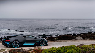 Black blue sportscar ocean road - the side of the road free wallpaper