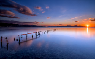 Sunset water dock mountains tranquil - derold page free wallpaper