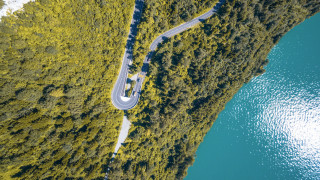 Winding road forest lake car - a lake free wallpaper