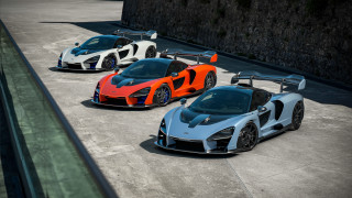Three supercars parking lot stone - perfect symmetry free wallpaper