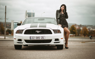 Woman mustang city outdoors highheels - a city in the background free wallpaper