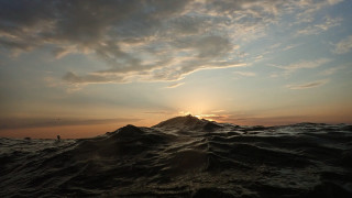 Sunset water island surfboard cityscape - a surfboard free wallpaper