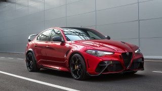 Red sports car driving street - a large window free wallpaper