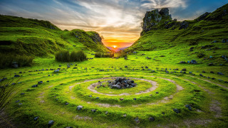 Green field spiral rock sunset - a spiral free wallpaper