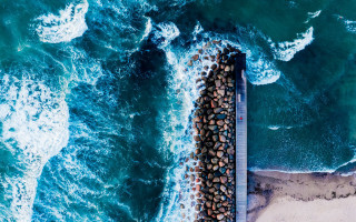 Pier rocks ocean beach tiltshift - a pier free wallpaper