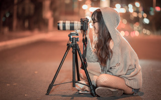 Woman camera tripod sitting fishnet - a microscopic photo free wallpaper for desktop