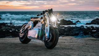 Motorcycle ocean sunset rock rim - a rock near the ocean free wallpaper