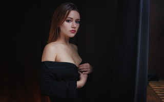 Woman black dress dark room 6 - a curtain behind her free wallpaper