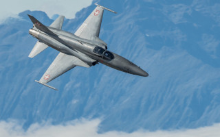 Fighter jet mountain sky puzzle - boleslaw cybi free wallpaper