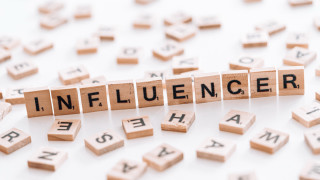 Influencer scrabble letters white surface - a white surface free wallpaper