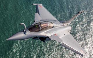Fighter jet ocean sunny red - aerial free wallpaper