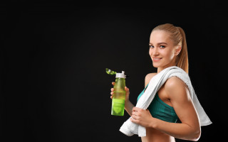 Woman holding water bottle towel - product photo free wallpaper