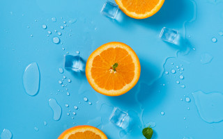 Three oranges on ice cubes - ice free wallpaper