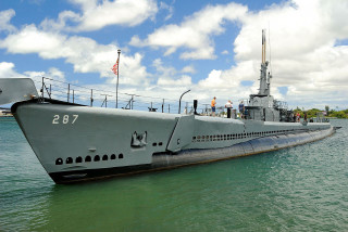 Large gray boat floating water 4 - a large gray boat free wallpaper