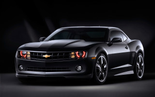 Black chevrolet camaro dark room - a spotlight free wallpaper