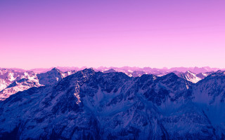 Mountain range pink sky plane 4 - a view of a mountain range free wallpaper