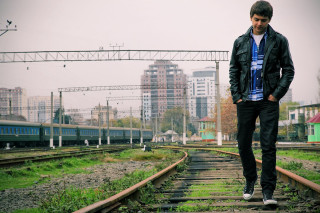 Man standing train track city - a man free wallpaper for desktop
