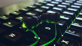 Keyboard glowing green 3d render - a close up of a keyboard free wallpaper