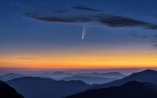 Mountain night sky shooting star - a view of a mountain range free wallpaper