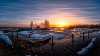 Frozen lake boat sunset magic - the shore free wallpaper