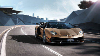 Gold sports car road sky - a sky background and a building in the background free wallpaper