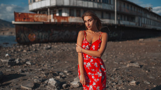 Woman red dress rocky beach - roof free wallpaper