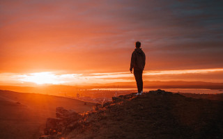 Man hilltop sunset clouds lake - top of a hill free wallpaper